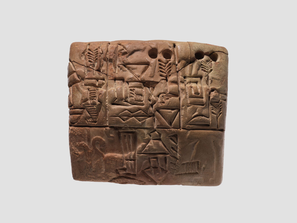 Tablet kuneiform berisi catatan administratif distribusi jelai sekitar 3100–2900 SM peninggalan peradaban Mesopotamia, sebagai bagian dari sejarah uang di dunia.